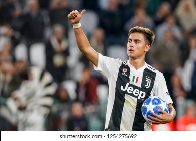 Turin, Italy, 02 October 2018. UEFA Champions League, Juventus vs Young Boys 3-0. Paulo Dybala, Juventus, with the ball for the three goal scored, celebrate the victory.