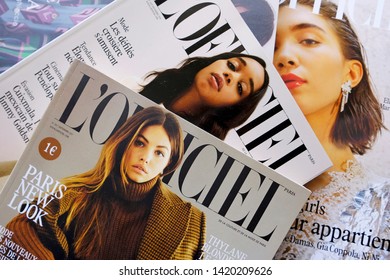 Turin, Italy - April 16, 2019: heap of fashion and lifestyle magazines - L'Officiel de la couture et de la mode de Paris