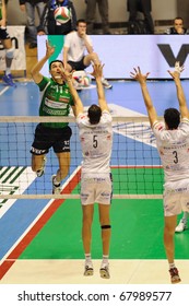 TURIN, ITALY- DECEMBER 29: Vladimir Nikolov (Lannutti) Strikes The Ball At Final Volleyball Match Italian Supercup Lannutti Bre Banca Cuneo Vs. Itas Diatec Trento, December 29, 2010 Turin, Italy.