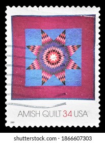 TURIN, ITALY - DECEMBER 3, 2020: A Stamp Printed In USA Showing Image Of A Lone Star Quilt, Amish Quilts Series, Circa 2001