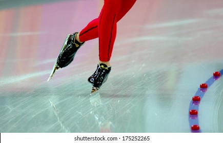 TURIN, ITALY FEBRUARY 12, 2006: Close Up Of An Ice Skater Legs Permorming During The Speed Ice Skating Competition Of The Winter Olympic Games Of Turin 2006.