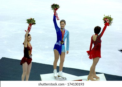 TURIN, ITALY- February 24, 2006: Arakawa Shizuka (Japan) Celebrates On The Podium The Golden Medal Won Duirng The Winter Olympics Female Finale Of Ice Figure Skating.