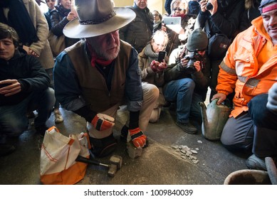 TURIN, ITALY - JANUARY 18, 2018: Artist Gunter Demnig Lays One Of His Stumbling Blocks At The 'Memory Blocks' Performance In Turin, Italy. He Started  In 1996 To Remember The Victims Of Nazism.