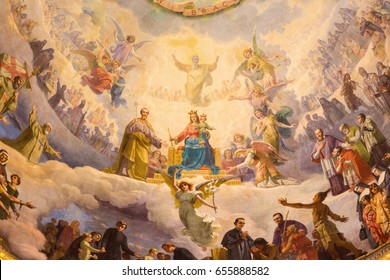 TURIN, ITALY - MARCH 15, 2017: The detail of fresco Mary Help of Christians in cupola of church Basilica Maria Ausiliatrice by Giuseppe Rollini (1889 - 1891).