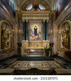 Turin, Italy - March 2022: An interior view of the Maria Ausiliatrice Sanctuary, with a close up on the Santa Maria Domenica Mazzarello Altair
