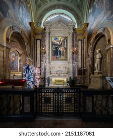 Turin, Italy - March 2022: An interior view of the Maria Ausiliatrice Sanctuary, with a close up on the San Domenico Savio Altair