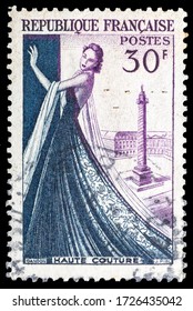 TURIN, ITALY - MAY 7, 2020: A Stamp Printed In FRANCE Celebrating Christian Dior Haute Couture, Circa 1953