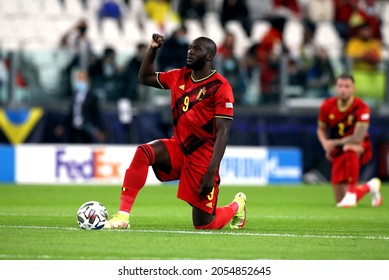 TURIN, ITALY - OCTOBER 7, 2021: 
Romelu Lukaku takes a knee in support of the Black Lives Matter movement
during the UEFA Nations League 2021 BELGIUM v FRANCE at Allianz Stadium. 