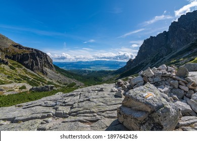 Turistic trail in High Tatras with view to valley on a sunny day, Slovakia - Shutterstock ID 1897642426