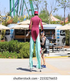 Turkey, Antalya, April 21, 2022: Circus Performer On Stilts