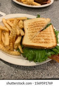 Turkey Bacon Avocado Sandwich With Fries.