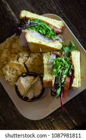 Turkey BLT Sandwich On Texas Toast With Sesame Seed Chips And Hummus