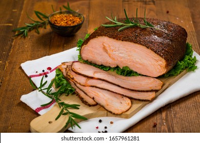 Turkey Breast Deli Roasted Sliced Cajun Style Lunch Meat On Wooden Background. Selective Focus.