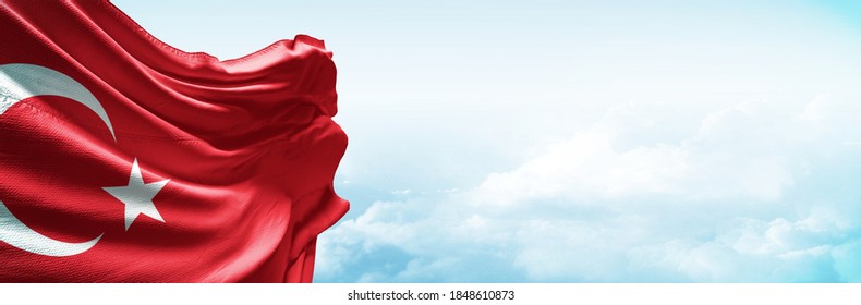 Turkey flag in the blue sky. Horizontal panoramic banner.