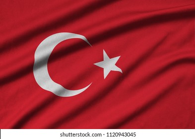 Turkey flag  is depicted on a sports cloth fabric with many folds. Sport team banner