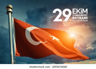 Turkey flag waving in the wind over dramatic cloudy sky during sunrise. "29 Ekim Cumhuriyet Bayrami Kutlu Olsun." Translation: "October 29, Happy Republic Day of Turkey." National holiday of Turkey.  - Shutterstock ID 2059676060