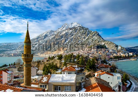 Turkey, Isparta province, beautiful Egirdir lake and Needle mountain with mosque in winter