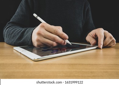 İzmir, Turkey - Jan 30,2020: A Man Drawing Illustration With Apple Pencil And Ipad Pro