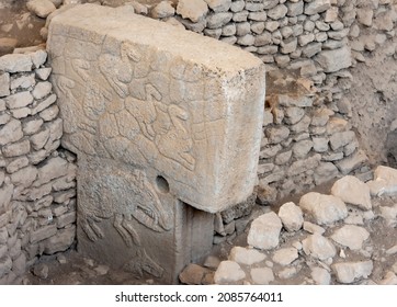 Göbeklitepe, Şanlıurfa, Turkey, January 22, 2019: Ruins of an ancient Neolithic temple built on a hill. It is one of the oldest religious structures. Close-up of animal figures engraved on stone.