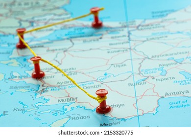 Turkey map with red fastener, Istanbul Izmir Canakkale Mugla travel route on map with red thumbtack, travel idea, vacation and road trip concept, Mediterranean destination, top view, selective focus