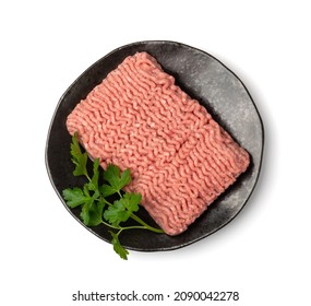 Turkey Mince Meat Isolated. Ground Fresh Fillet, Uncooked Turkey Mincemeat, Raw Forcemeat, Farce Meat Portion With Greens On White Background Top View