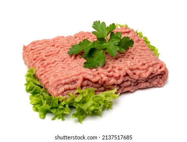 Turkey Mince Meat Isolated. Ground Fresh Fillet, Uncooked Turkey Mincemeat, Raw Forcemeat, Farce Meat Portion With Greens On White Background