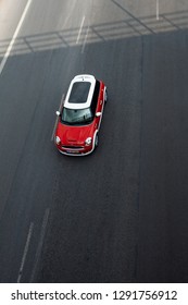 İzmir, Turkey. October 23, 2012. Top View Of A Red Colored Mini Cooper Car On The Road.