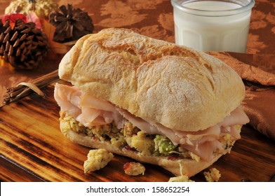 A Turkey Sandwich With Cranberry Sauce And Cornbread Stuffing On A Ciabatta Roll