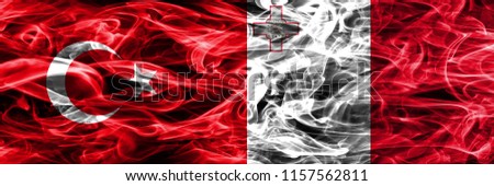 Turkey vs Malta smoke flags placed side by side. Turkish and Malta flag together