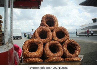 Turkish bagel simit close up. Fresh baked pastries for sale on the streets