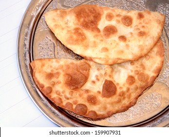 Turkish cheese pie fried in oil ( Cig borek ) ( Raw pie or Tatar pie )