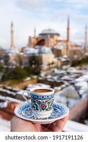 Turkish Coffee with Hagia Sophia background in Istanbul, Turkey. Turkish Coffee with traditional porcelain cup.