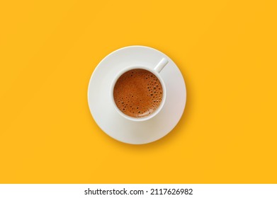 Turkish coffee on yellow background.