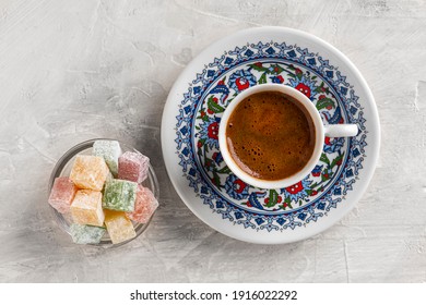 Turkish Coffee with traditional porcelain cup. Coffee presentation with Turkish delight. Sparkling Turkish Coffee. - Powered by Shutterstock