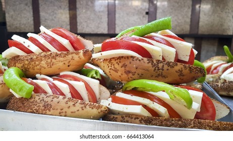 Turkish Cold Sandwich With Sliced Tomato, Feta Cheese, Salt And Hot Green Pepper. Izmir Kumru.