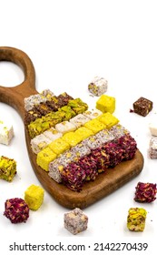 Turkish Delight Double Roasted Gourmet Mix. Assortment of turkish delight isolated on white background. Delights cut into small slices. close up