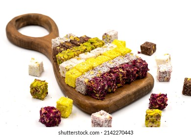 Turkish Delight Double Roasted Gourmet Mix. Assortment of turkish delight isolated on white background. Delights cut into small slices. close up