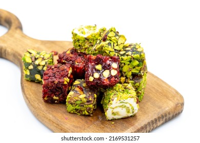 Turkish delight isolated on a white background. Traditional Turkish delicacies. Varieties of Turkish Delight with Pistachio. close up - Shutterstock ID 2169531257
