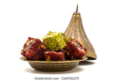 Turkish delight isolated on a white background. Traditional Turkish delicacies. Varieties of Turkish Delight with Pistachio. close up - Shutterstock ID 2169531273