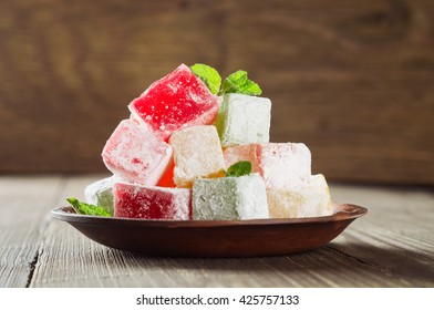 Turkish Delight On A Wooden Table.