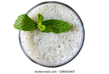 Turkish Drink Ayran Or Kefir With Fresh Herbs In A Glass. Buttermilk Made With Yogurt. (yogurt, Youghurt, Kefir, Ayran, Lassi). Isolated White Background