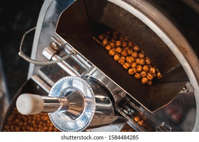 Turkish fast food. Roasting appetizing pea chickpeas in a shiny retro vending machine on the street. - Powered by Shutterstock