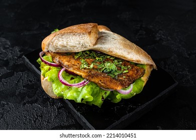 Turkish Fish Sandwich With Grilled Mackerel Fillet Balik Ekmek. Black Background. Top View.