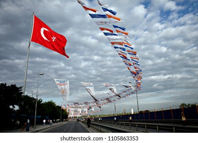 A Turkish Flag And Flags  Of A Justice And Development Party Waving (AKP) In Istanbul, Turkey On May 30, 2015.