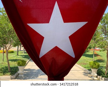 The Turkish flag is a red field featuring a white star and crescent.