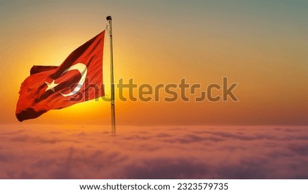 turkish flag and sunset background on clouds