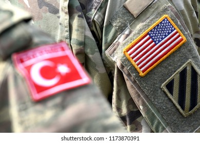 Turkish Flag And US Flag On Army Uniform. Turkish And US Troops