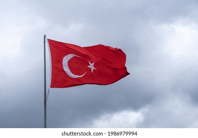 turkish flag waving, cloudy sky, flagpole,