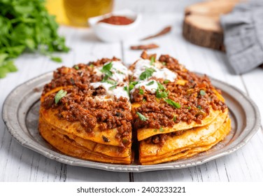 Turkish Food Kayseri Yaglama with Minced Meat, Yogurt and Tomato Paste - Powered by Shutterstock