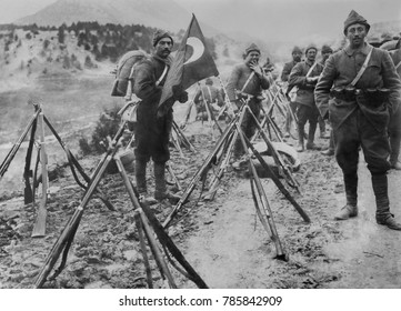 Turkish Infantry Column At Rest With Flag And Rifles During World War I.